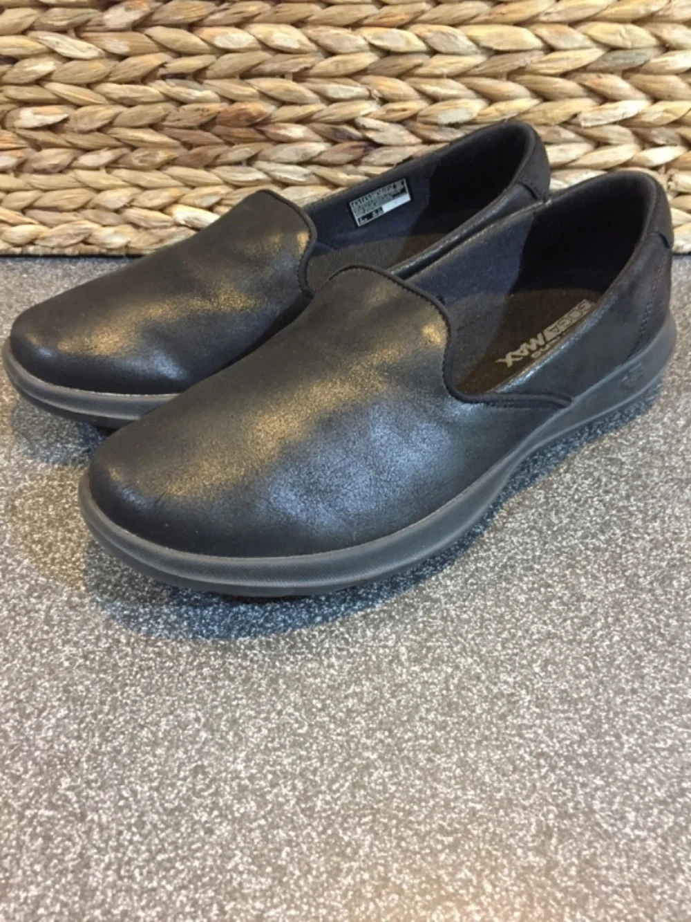 Skechers black slip